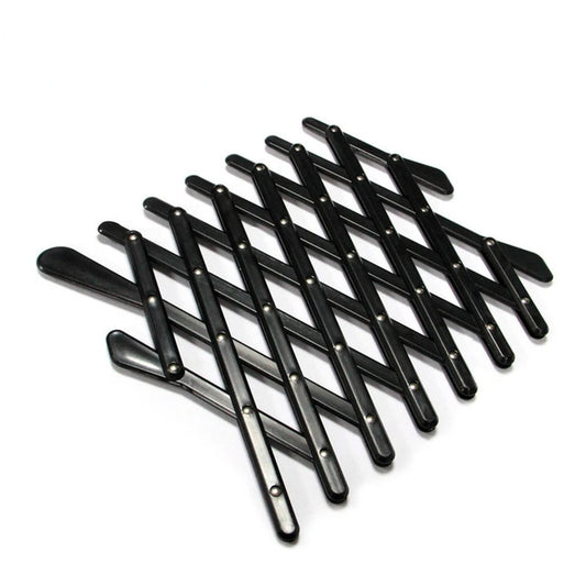 Set of professional black salon hairdressing sectioning clips, perfect for styling and precision cuts, on a white background.